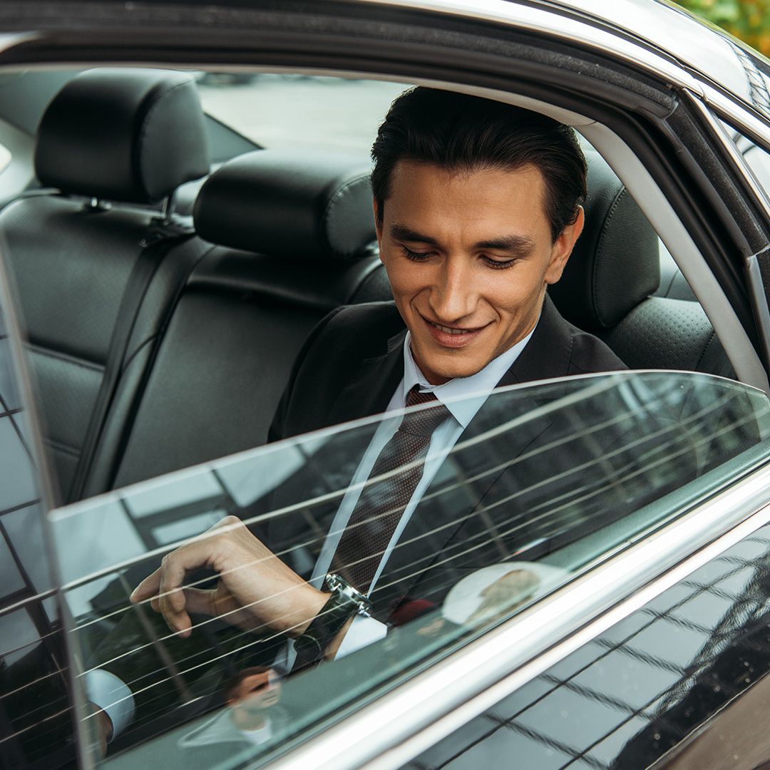 Family in car taking selfie